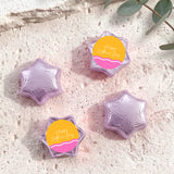 Light purple foil star chocolates with “Happy Mother’s Day” label, arranged in set.