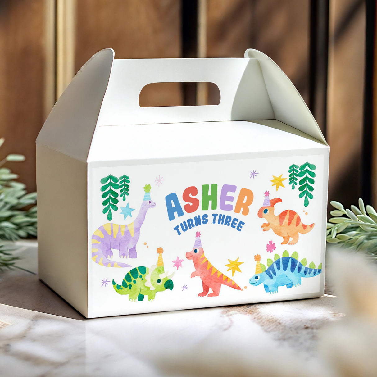 Dinosaur birthday gable favour box, white with colorful dinos and 'Asher turns three'