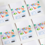 White printed chocolate birthday wrappers with colorful dinosaur design and Asher text