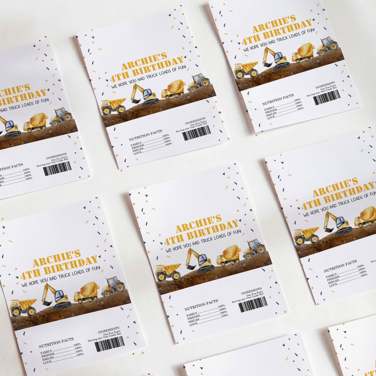 Construction-themed birthday chocolate wrappers, beige with tractor illustration and ARCHIE'S text