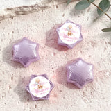 Purple star-shaped foil balloons with 'Charlotte's Baby Shower' teddy design