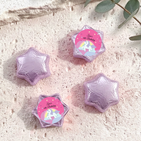 Lilac star-shaped foil chocolate with “Zara’s 6th Birthday” unicorn rainbow label
