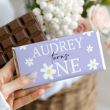 Purple birthday chocolate bar wrapper with Audrey turning ONE and daisy pattern