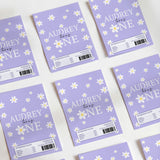 Purple birthday chocolate wrappers with daisy pattern and "Audrey One" text