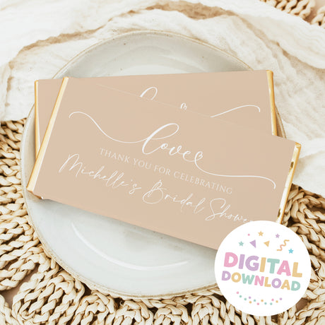 Beige chocolate bar wrapper with white cursive message and digital download badge