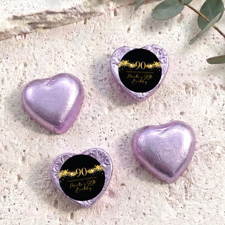 Purple foil heart chocolates with black 90 birthday label and gold star text