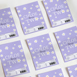 Purple daisy printed chocolate wrappers with 'CHLOE TW' text and barcode