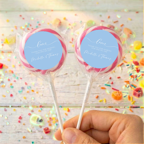Personalised baby blue wedding lollipops with round love message labels, pink rim