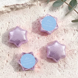 Purple foil-wrapped chocolate stars with round personalized label discs