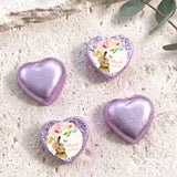 Lavender and purple foil-covered chocolate hearts with floral wrapped centers