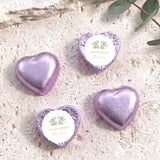 Lavender foil-covered chocolate hearts with printed personalised label, glossy heart shapes