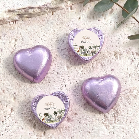 Foil-covered chocolate hearts, purple heart foil with circular jungle scene labels