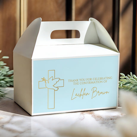 Light blue personalised gable favour box with white handle and gold cross design