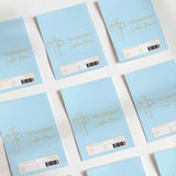 Blue DIY printed chocolate wrappers with cross, name text, and barcode label