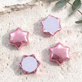 Pink foil star chocolates with cross on centre label