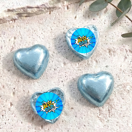 Blue foil-covered chocolate hearts with round 'Best Dad' label.