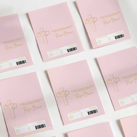 Pink DIY printed chocolate wrappers with cross design, text, and barcode labels