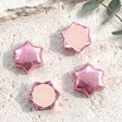 Set of 5 foil-covered star chocolates, pastel pink foil with white label