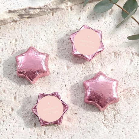 Pastel peach foil chocolate stars with cross and personalised pink label