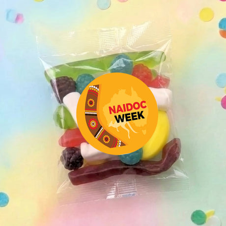 Personalised party mix lolly bag with NAIDOC Week sticker, clear green wrapper