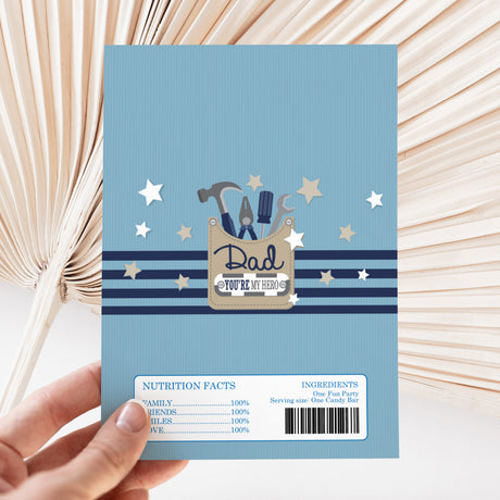 Blue Father's Day chocolate wrapper with 'Dad' tool graphics and nutrition facts panel