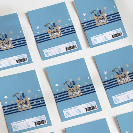 Set of blue Father's Day chocolate wrappers with 'Dad' tool graphics and nutrition facts