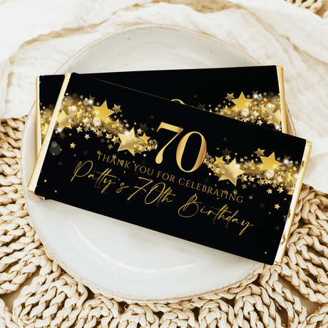 Black 70th birthday chocolate bar with gold stars, “Thank you” and birthday text