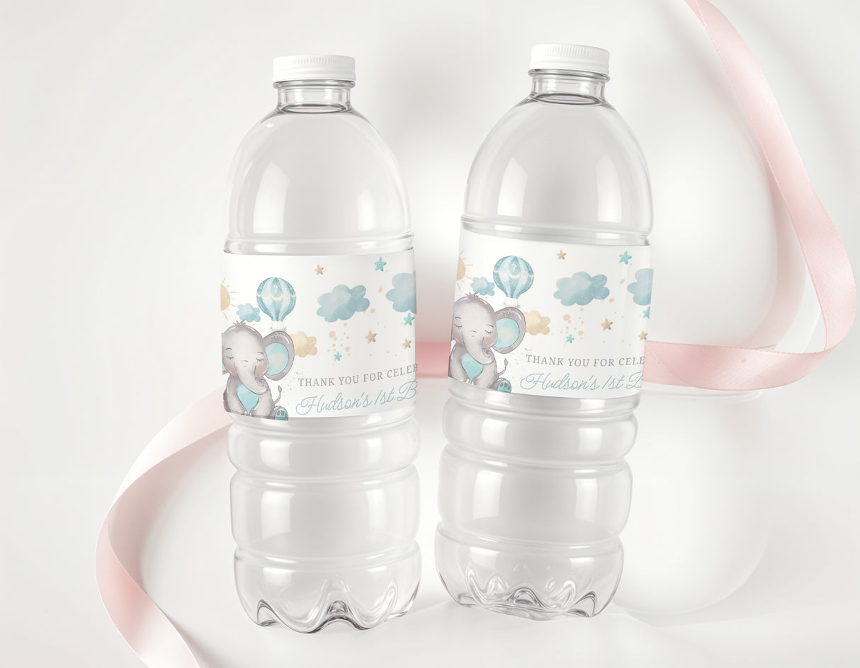 Blue elephant-themed first birthday water bottle labels on clear drink bottles
