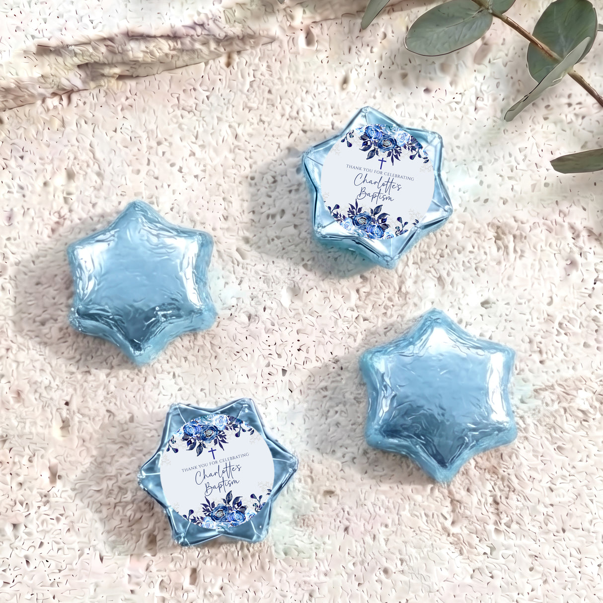 Baptism foil chocolate stars: blue floral thank-you label on light blue star
