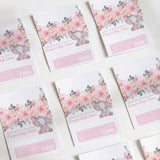 Pink floral elephant baby shower chocolate wrappers with printed message and barcode
