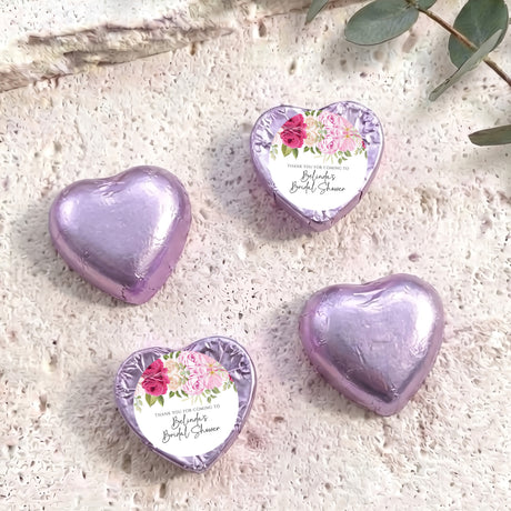 Foil-covered heart chocolates in lavender with floral personalised labels