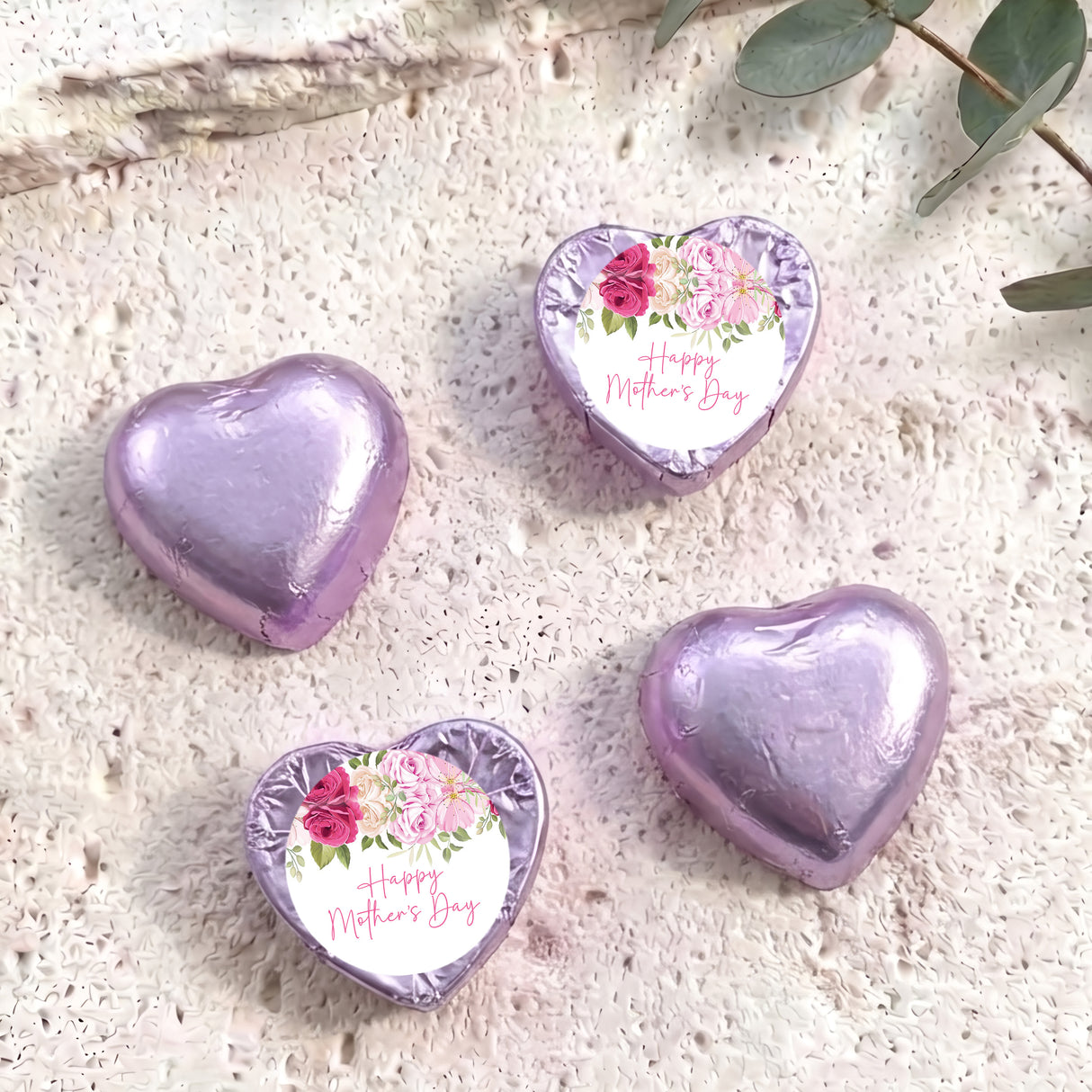 Purple foil-covered heart chocolates with floral 'Happy Mother's Day' message