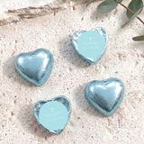 Pastel blue heart foil chocolates with cross and personalised label