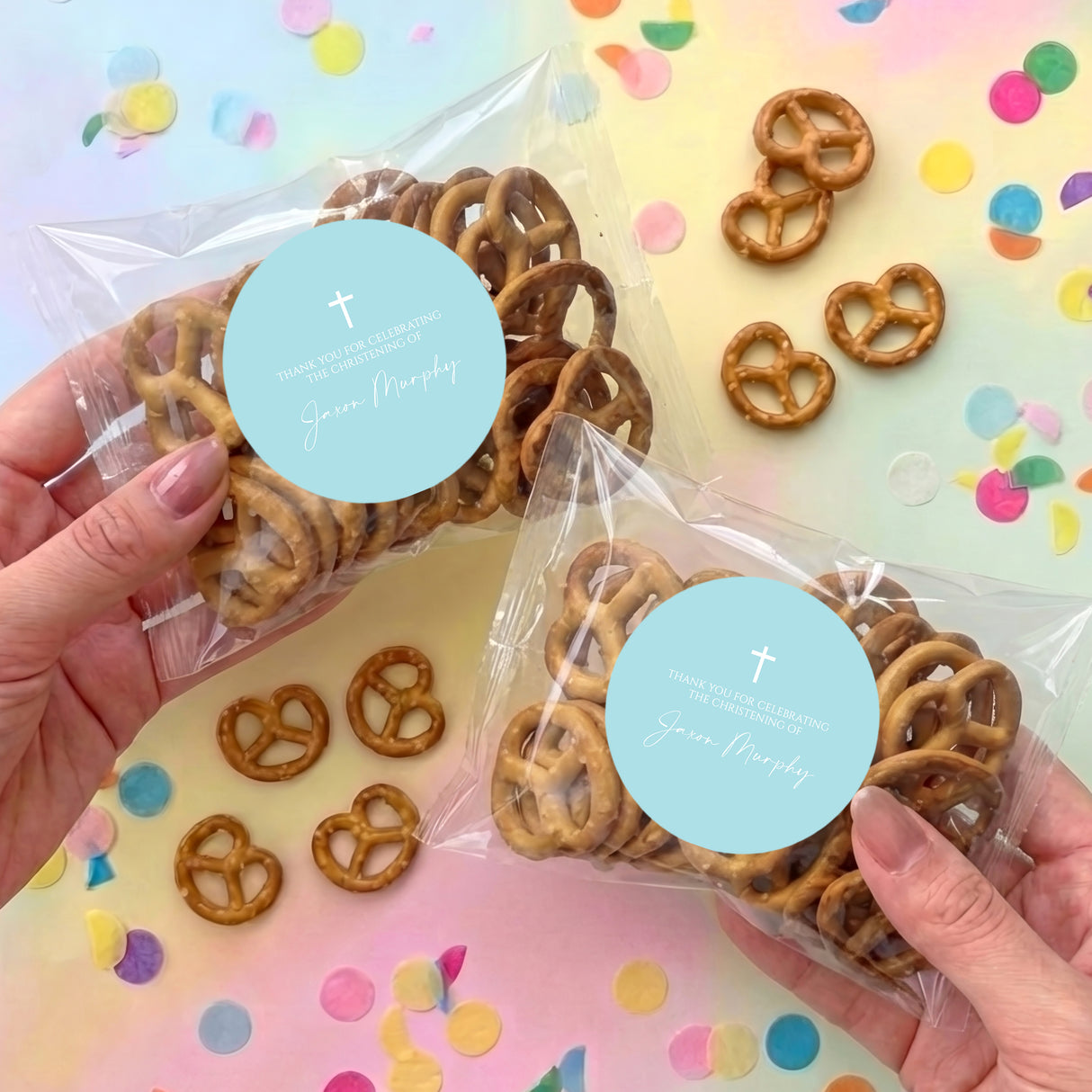 Pastel blue christening pretzel bag set with white cross seal and personalised text