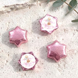 Pink foil star balloons set with personalised chocolate-star label