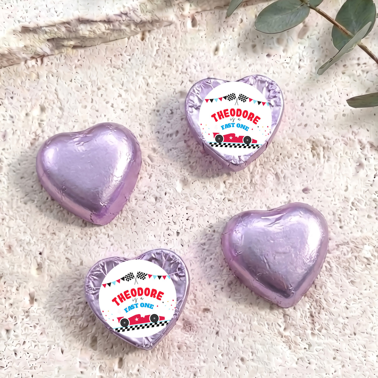 Foil-covered chocolate hearts, lavender with white Theodore label