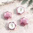 Foil chocolate stars in pink with balloon-themed label sticker