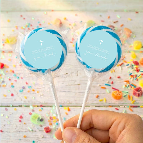 Personalised First Communion lollipops with blue round labels, white cross, blue border
