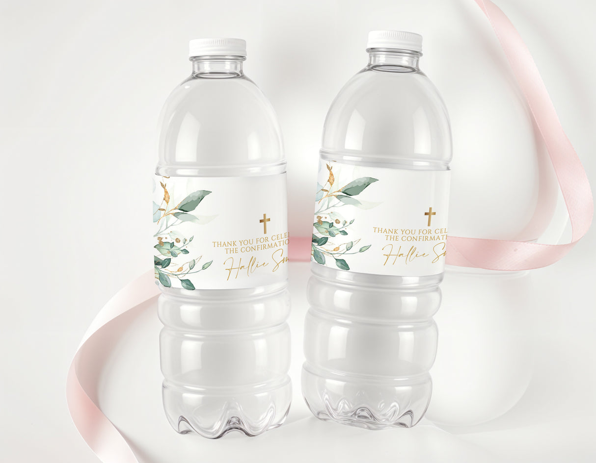 Personalised water bottle labels on two clear plastic drink bottles with eucalyptus and gold cross