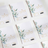 DIY printed chocolate wrappers with eucalyptus leaves, gold cross, and fill-in message lines