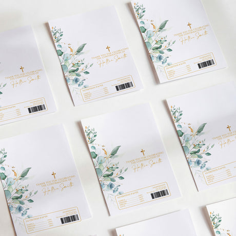 DIY printed chocolate wrappers with eucalyptus leaves, gold cross, and fill-in message lines