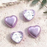 Foil-covered chocolate hearts in lavender with personalized label