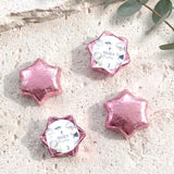 Foil-covered star chocolates with personalized label, pink foil stars