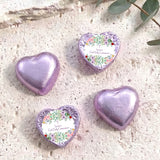 Purple foil-covered chocolate hearts, three hearts with personalised First Holy Communion label