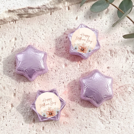 Purple foil-covered chocolate stars with a “Happy Mother’s Day” label card
