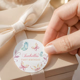 Pastel butterfly round label with “FIRST BIRTHDAY” text