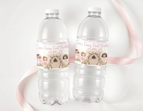 Personalised birthday water bottle labels on clear plastic bottles, pink fairy theme