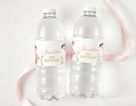 Clear water bottles with "2nd Birthday" labels for Freddie