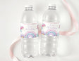 Personalised water bottle labels on two clear bottles with rainbow and fairy design