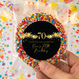 Personalised 70th birthday freckles badge with black circle, gold “70” and stars, colorful sprinkles